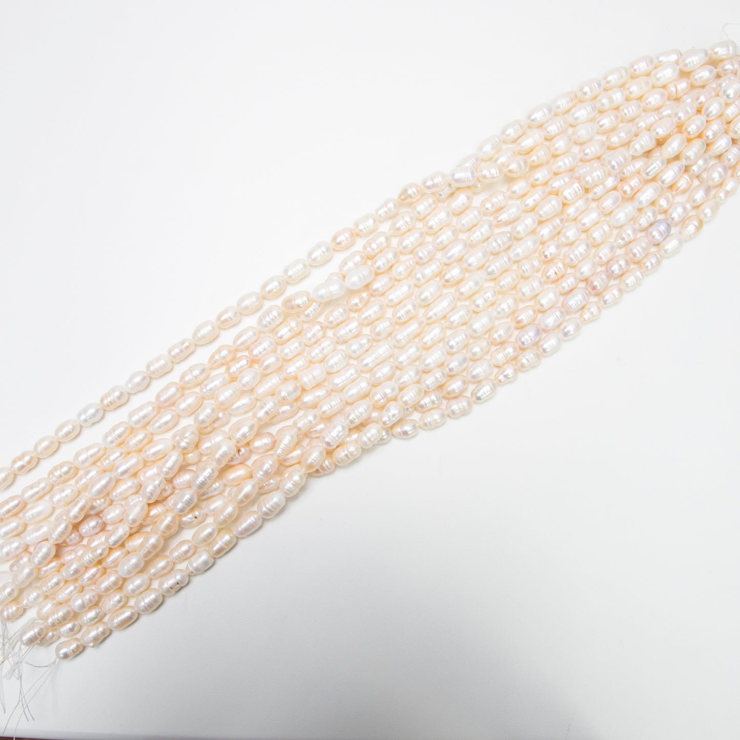 【250083】淡水パールライス縞入り 約12~14×7~8㎜ (1連41cm)