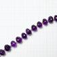 【250054】BIG!アメジストボタンカット　約5~8×10~11.5mm (1連19cm）